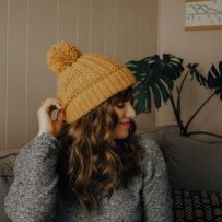 Top Hairstyles That Stay Stylish Under a Winter Hat